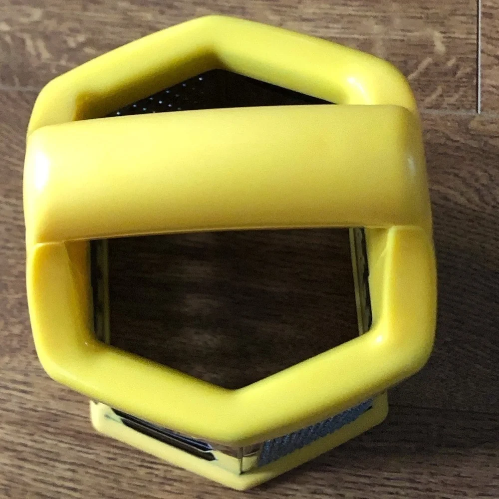 Yellow veggie and cheese grader